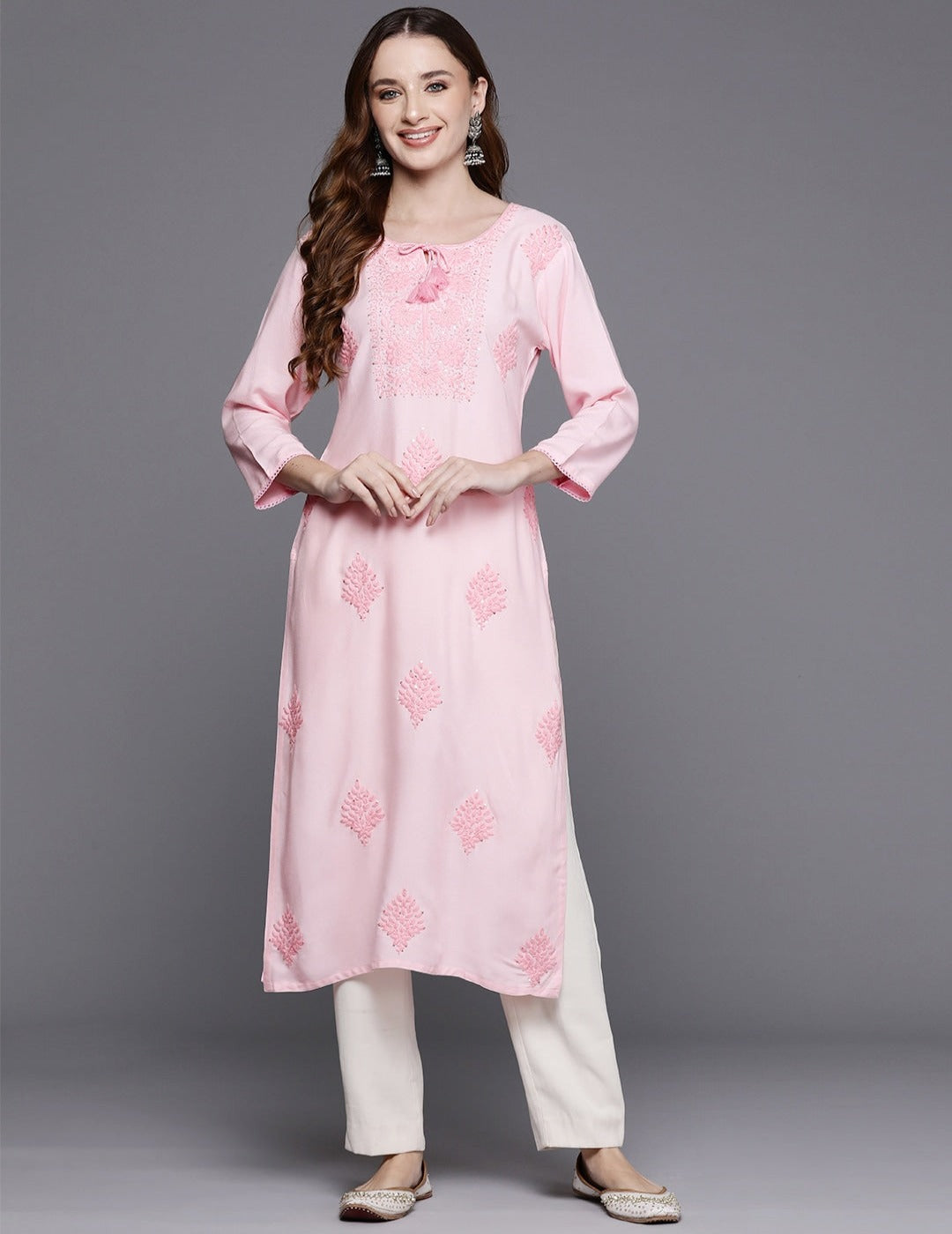 Floral embroidered tie-up neck kurta.